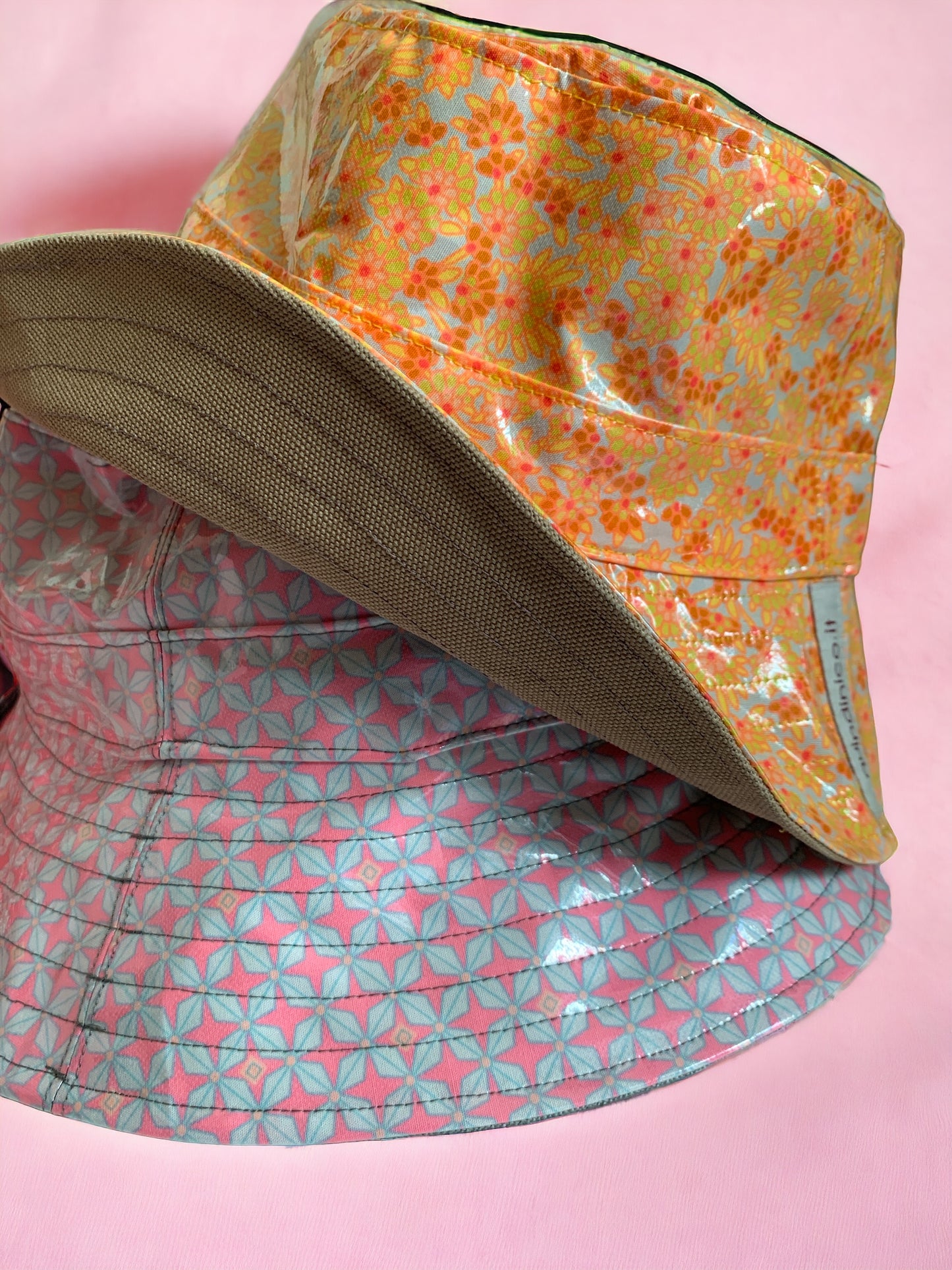 Cappello da pioggia Rosa Grigio